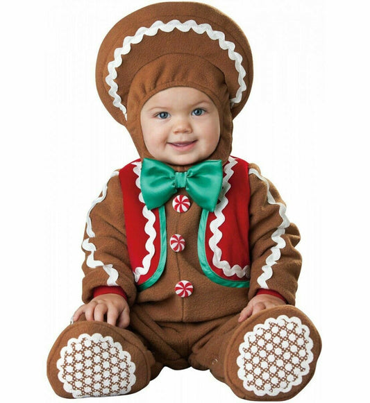 Sweet Gingerbaby Gingerbread Christmas Baby Infant Costume Lined zippered jumpsuit with attached vest and leg snaps for easy diaper change Hood with rickrack trim and slip-on booties with skid resistant bottoms. Booties are for indoor use only.