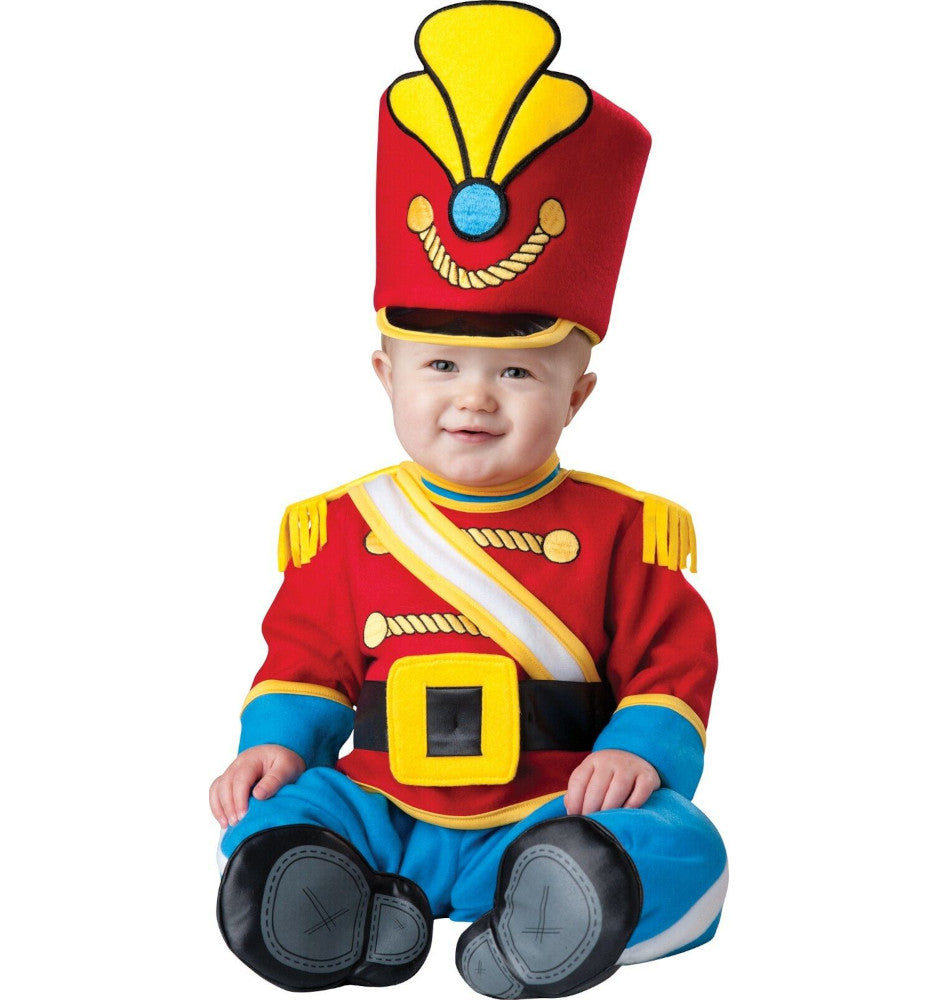 Tiny Toy Soldier Nutcracker Christmas Baby Infant Costume Lined zippered jumpsuit with attached belt and epaulettes and leg snaps for easy diaper change Hat Plus booties with skid resistant bottoms